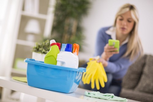Technician performing carpet cleaning in a modern office